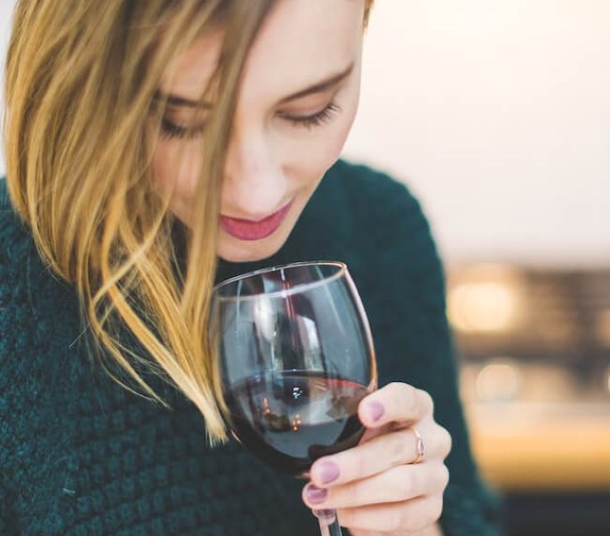 woman with a glass of wine